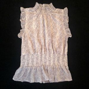Sleeveless peplum snake skin printed top
